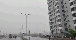 শীতসকালে বৃষ্টিতে ভিজল নগর